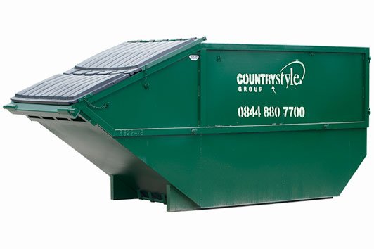 Rear end loader skips